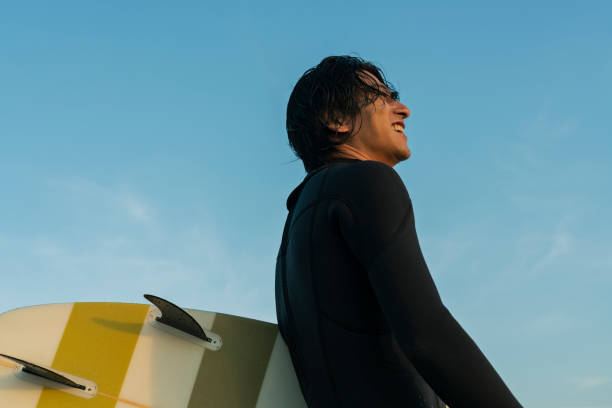 istock Man surfing in the morning ocean. 2159193248