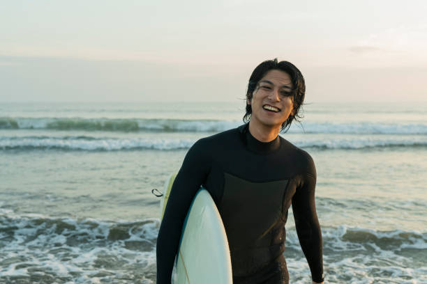 istock Man surfing in the morning ocean. 2159193519