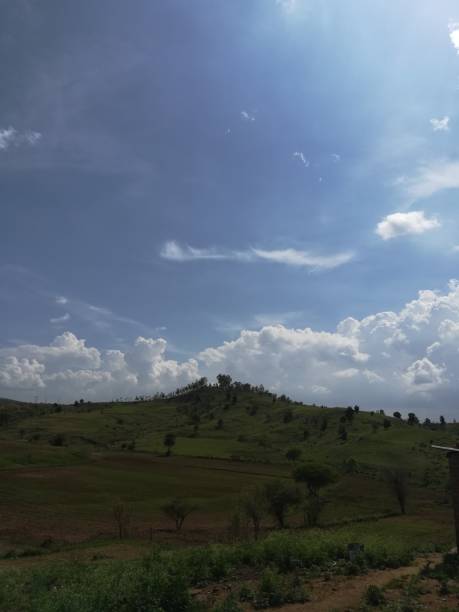istock The beautiful sunny weather view in the sky with white clouds 2159194136