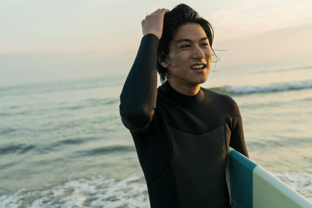 istock Man surfing in the morning ocean. 2159194325