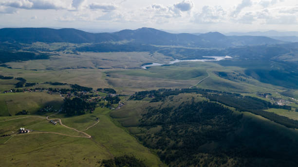 istock Aerial top view forest tree, forest ecosystem and healthy environment concept background, Texture of green tree forest view from above, Beautiful sunrise over the mountains of western Serbia 2159195891