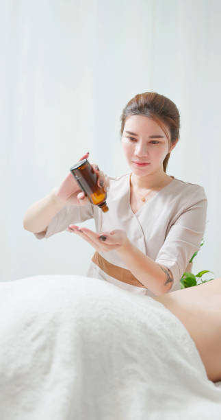 istock asian masseur essential oil hand 2159199564