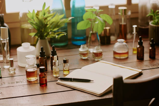 istock Wooden Table With Samples of Perfume 2159202694