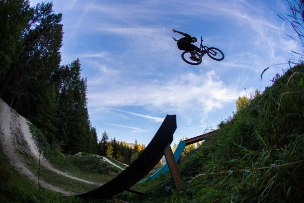 Bike park in the open air. Trails and hills for extreme cycling. Sports, active recreation.