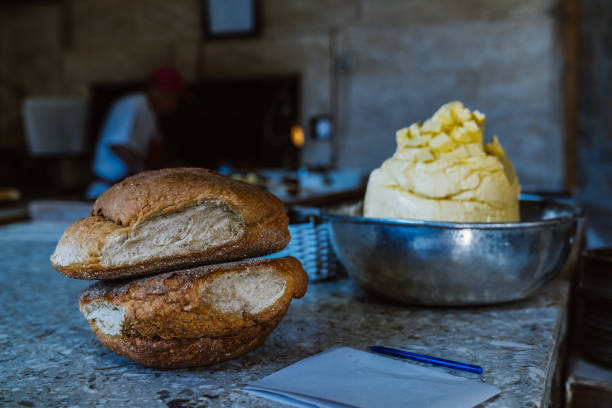 Freshly baked Trabzon bread and a mound of rich, local butter in a traditional Turkish bakery.