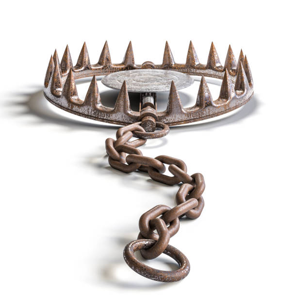 istock Old rusty bear trap waiting to be sprung on white background 2159208923
