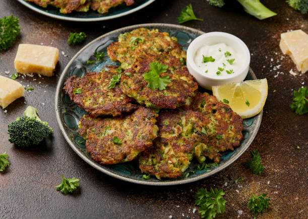 istock Fried Broccoli fritters or pancakes with parmesan and mozzarella cheese 2159210314