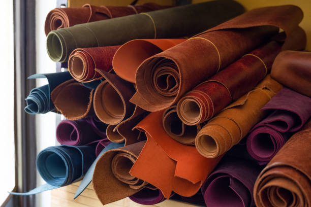 istock Different pieces of leather in a rolls 2159211204
