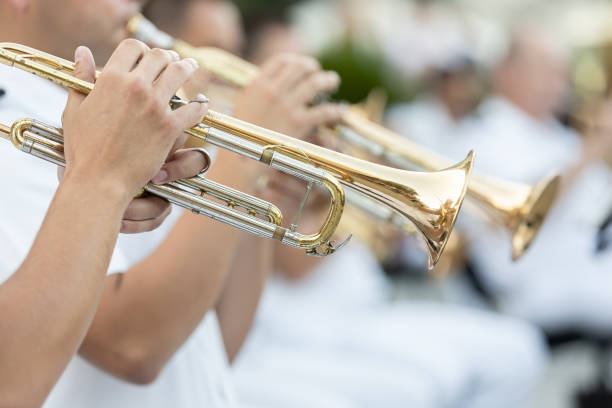istock musicians are playing on trumpets 2159212344