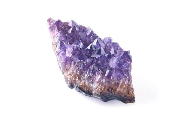 Bright purple amethyst isolated on white background.