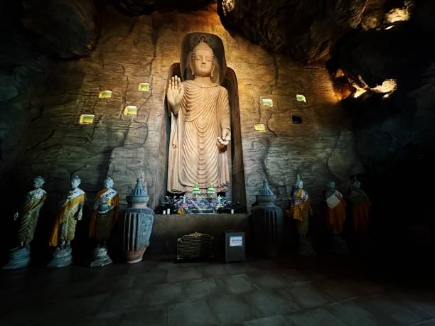 istock Buddhist Cave Religion Site in Thailand 2159228078