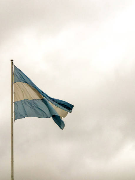 istock Argentine flag flaming over a cloudy sky 2159231786