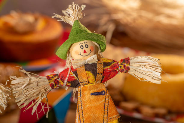 istock Festa Junina, straw dolls in front and in the blurred background a table full of sweets from the Brazilian Festa Junina, selective focus. 2159238675
