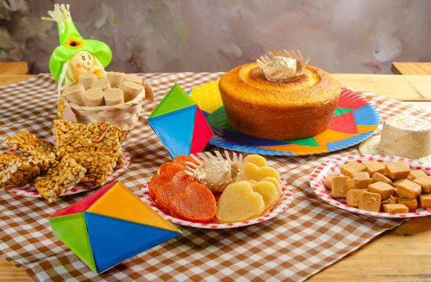 istock Festa Junina, beautiful rustic table with dishes containing various types of sweets for Festa Junina in Brazil, selective focus. 2159239345