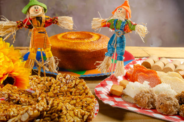istock Festa Junina, beautiful rustic table with dishes containing various types of sweets for Festa Junina in Brazil, selective focus. 2159239905