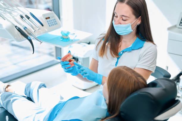 istock Dentist teaches child oral hygiene 2159249249