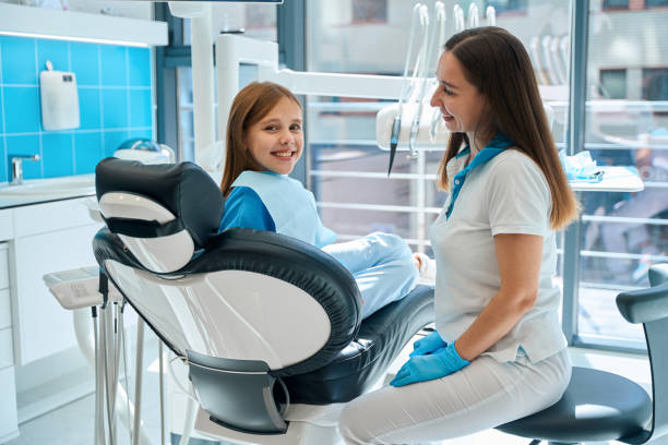 istock Girl smiling at a dentist appointment 2159249269