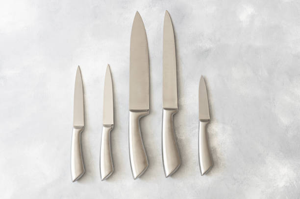 istock Casting steel various chef knife, Set of modern sharp kitchen knives on white background 2159250825