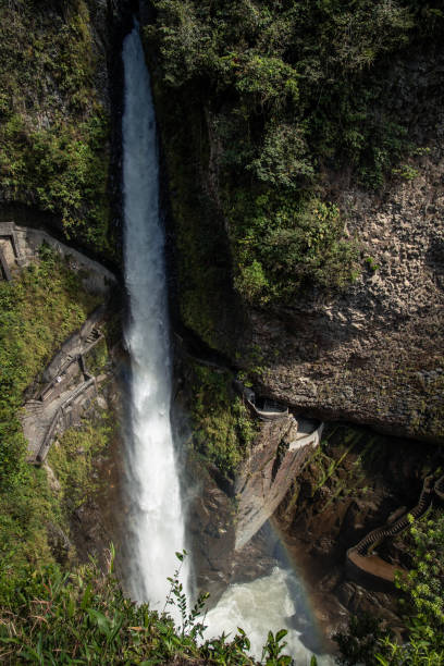 istock vertical Pailon del Diablo Waterfall Cascading Between Rocks Creating a Rainbow, Ecuador 2159252246