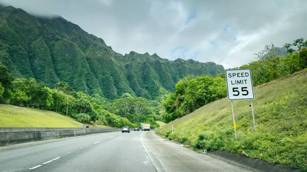 Street view form Interstate H-3 highway called John A. Burns Freeway driving west on the Hawaiian island of Oahu, USA