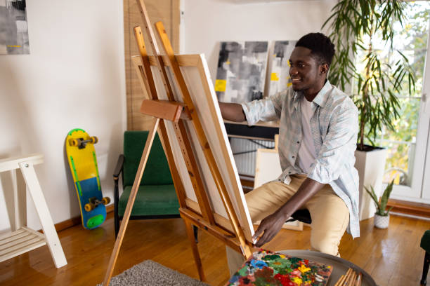 istock Male artist painting 2159256741