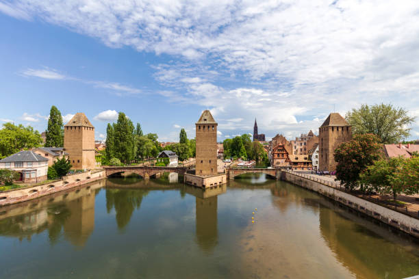 istock Scenic Canal and Historic Tower in Strasbourg 2159259571