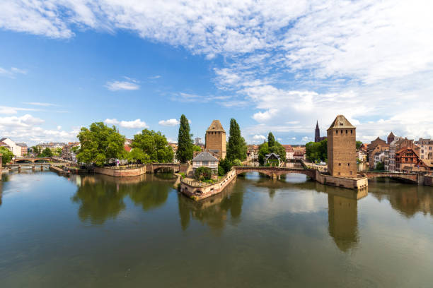 istock Scenic Canal and Historic Tower in Strasbourg 2159259604