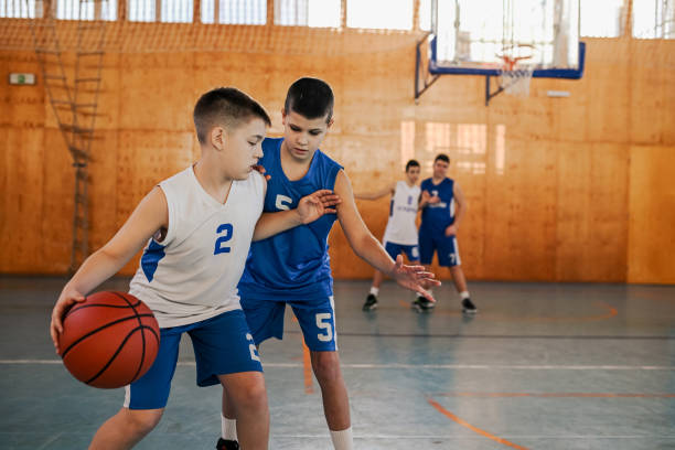 istock Youth basketball player makes a move 2159261535