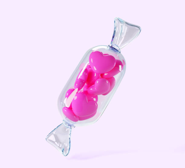 istock 3d candy with small pink hearts inside render icon. Love shape lollipops in transparent plastic pack for Valentine or Mother day. Wrapped sweet in clear package isolated on background 2159267169