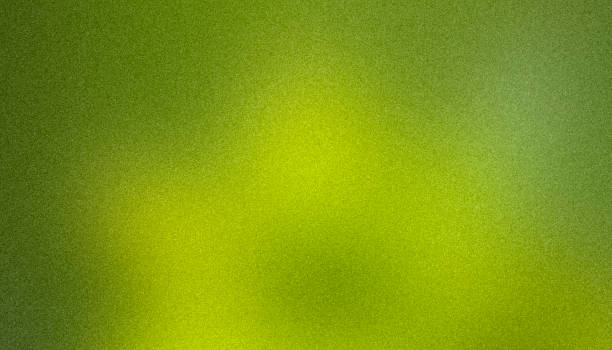 istock Bright green abstract background with light spots, rough texture, grainy noise. 2159269454