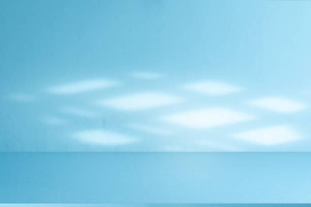 istock Wall interior background, studio, and backdrops show products. with shadow from window color white and blue light. background for text insertion and presentation of product 2159284796