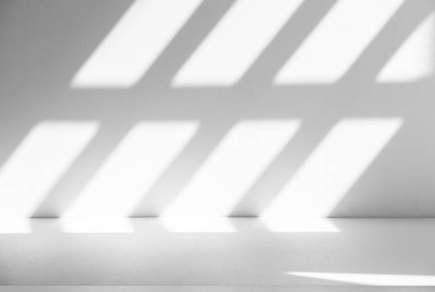 istock Wall interior background, studio and backdrops show products.with shadow from window color white . background for text insertion and presentation product 2159284819