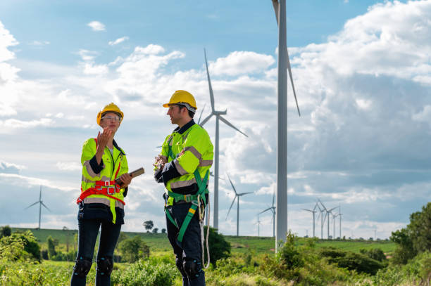 istock Two men in safety gear are standing next to each other 2159286793