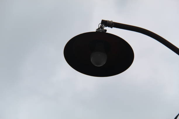 European style metal street lights on the street under the blue sky