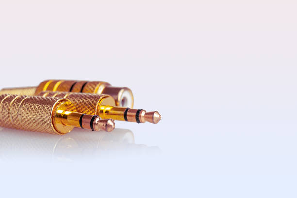 istock 3.5 gold plated audio input and output connectors for audio signal devices, isolated on background 2159292219