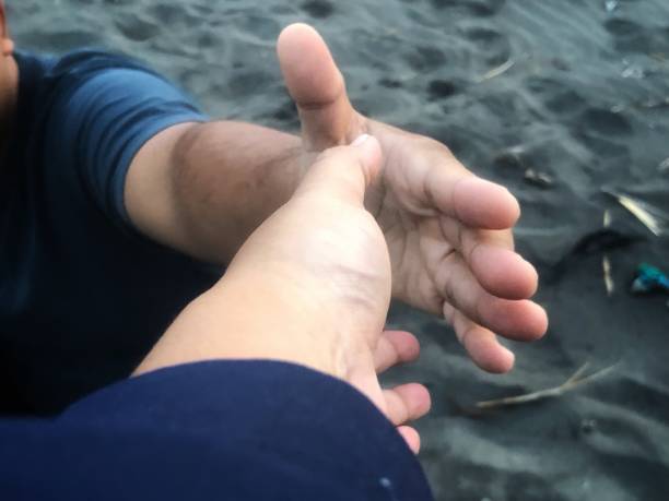 istock someone who stretches out his hand to help others 2159292760