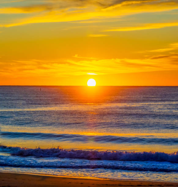 istock Sunrise at the seaside with high cloud 2159293451