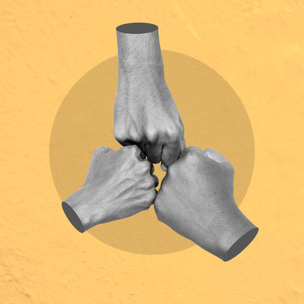 istock Three hands giving fist bumps together in a circle 2159294102