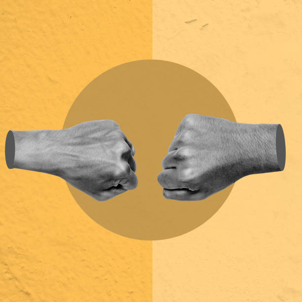 istock Two hands giving fist bumps together in a circle 2159294142