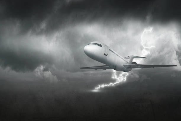 A white airplane flying through a stormy sky. The sky is dark and cloudy, and there is a lightning bolt in the air. Scene is tense and dramatic, as the airplane is flying through a dangerous