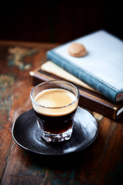 istock Coffee in glass cup on dark background. Close up. 2159296288