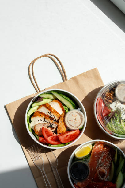 istock Take out poke bowl with craft bag on white background 2159297899
