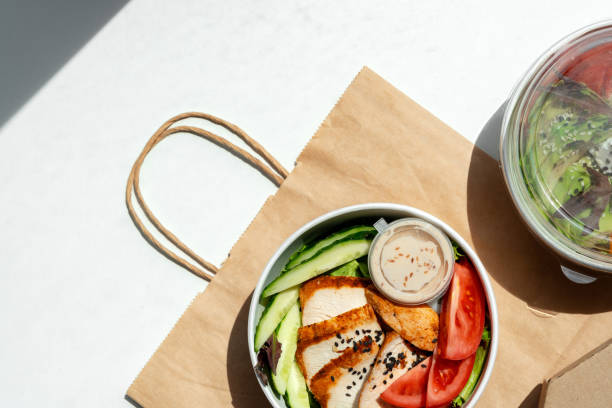 istock Take out poke bowl with craft bag on white background 2159297951
