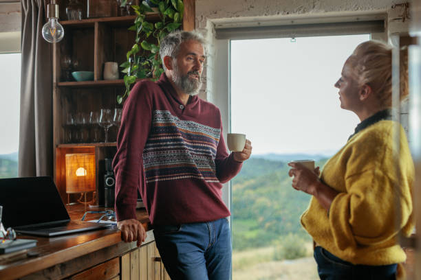 istock Senior couple, conversation at home 2159298123