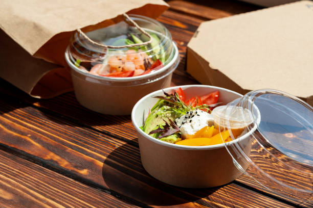 istock Take out poke bowl on wooden background 2159298334