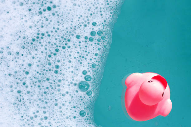 istock Pink rubber duck in water with soap foam 2159298915