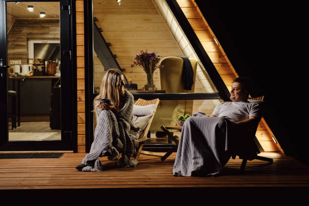 istock An evening conversation between a friendly couple on the terrace 2159299336