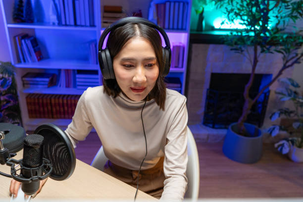 istock Asian woman doing live stream on online platform 2159299390