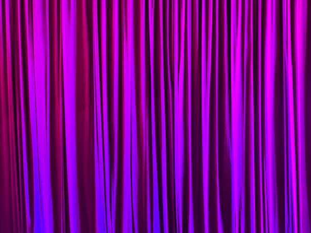 istock Pink curtain in the theater as an abstract background. Texture 2159299399