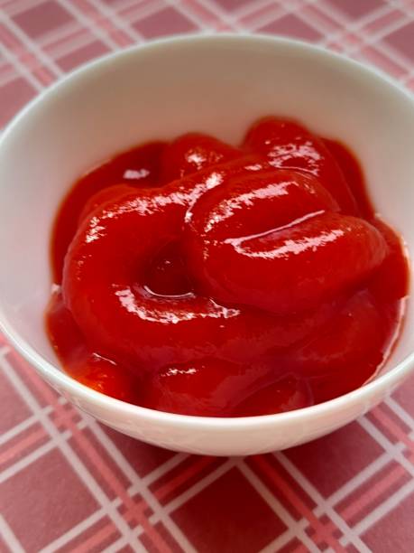 istock Ketchup in small plate isolated 2159304075